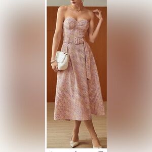 Classic pink plaid strapless dress with A line skirt.